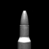 Silver bullet on black background